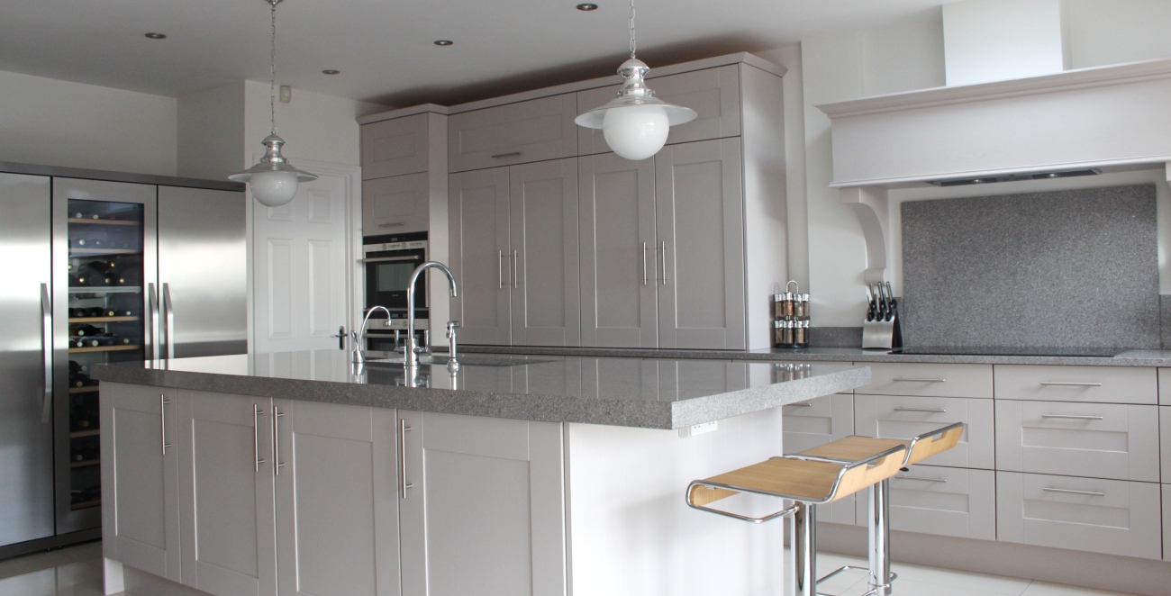 White kitchen with grey granite worktop