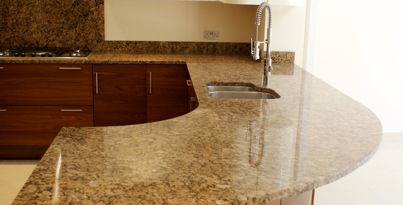 Natural stone peninsular with radius
