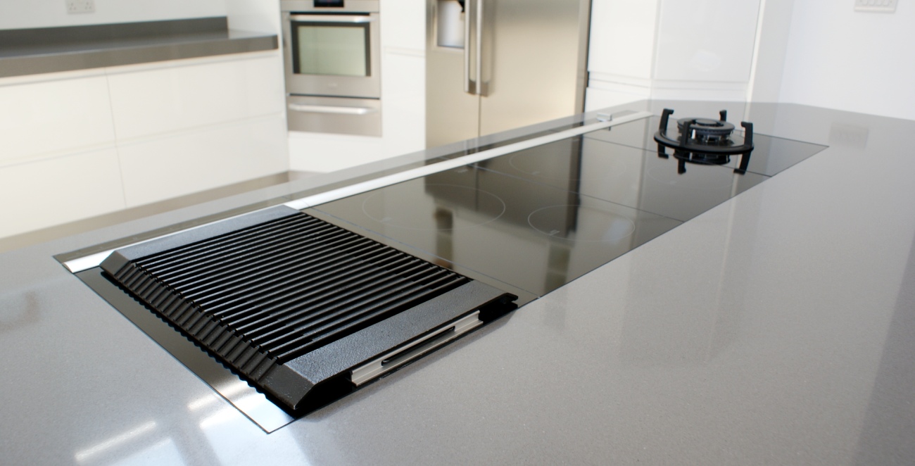 Recessed hob flush with surface